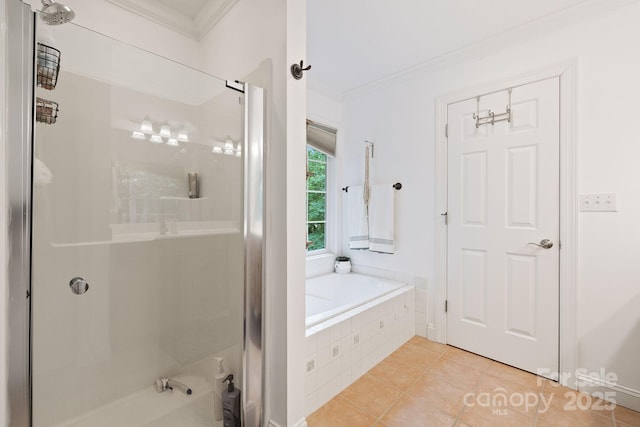 226 Duncan Estate Dr, Fletcher, NC 28732 - bathroom with a stall shower, ornamental molding, a garden tub, and tile patterned flooring