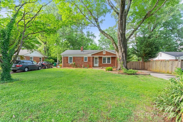 2953 Enfield Rd, Charlotte, NC 28205 - ranch-style home with a chimney and brick siding