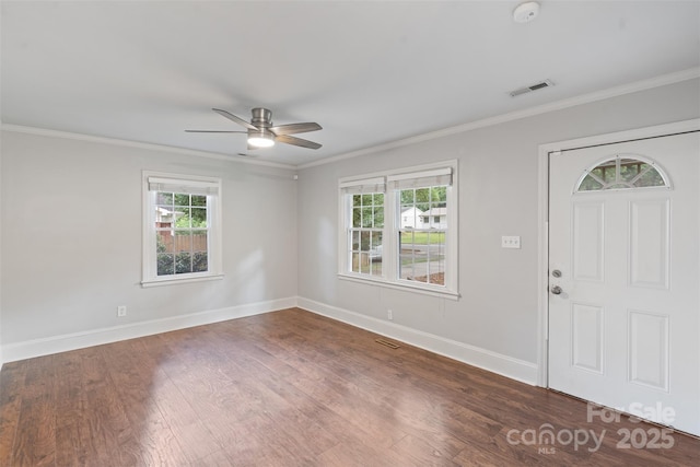 2953 Enfield Rd, Charlotte, NC 28205 - entryway featuring plenty of natural light, a ceiling fan, baseboards, and crown molding