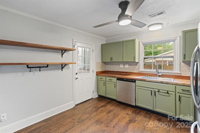 2953 Enfield Rd, Charlotte, NC 28205 - kitchen with green cabinets, wood counters, stainless steel dishwasher, a sink, and decorative backsplash