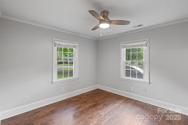 2953 Enfield Rd, Charlotte, NC 28205 - spare room with plenty of natural light, baseboards, wood finished floors, ornamental molding, and ceiling fan