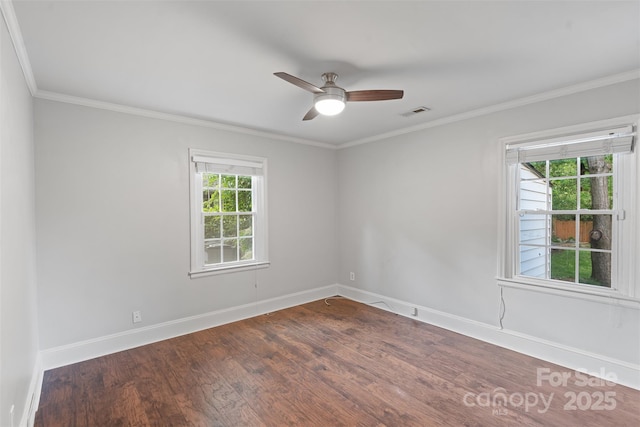 2953 Enfield Rd, Charlotte, NC 28205 - spare room featuring dark wood-style floors, baseboards, a ceiling fan, and crown molding