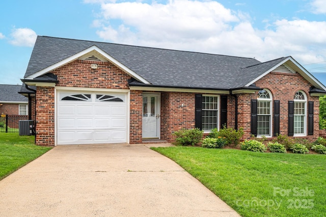 1909 Wexford Ct, Gastonia, NC 28054 - view of front of house with an attached garage, brick siding, concrete driveway, a shingled roof, and central air condition unit