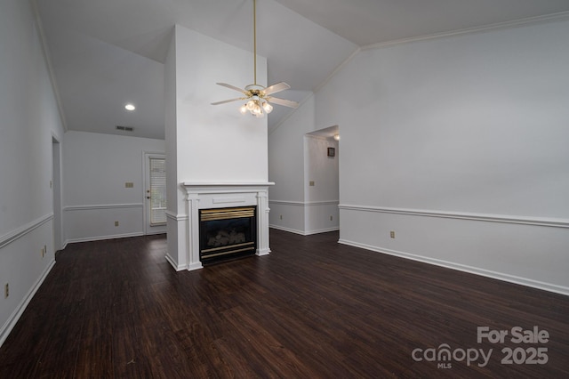 1909 Wexford Ct, Gastonia, NC 28054 - unfurnished living room with vaulted ceiling, a ceiling fan, dark wood-style floors, a fireplace, and baseboards