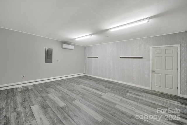 2706 Stagbuck Dr, Gastonia, NC 28052 - finished basement with a wall mounted AC, wood finished floors, electric panel, and baseboards