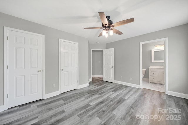 2706 Stagbuck Dr, Gastonia, NC 28052 - unfurnished bedroom featuring light wood-type flooring, baseboards, and ensuite bath