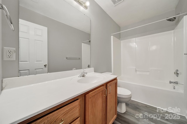 2706 Stagbuck Dr, Gastonia, NC 28052 - full bathroom with wood finished floors, toilet, vanity, and shower / bath combination
