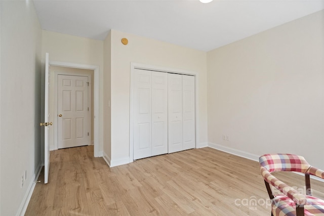 608 Camrose Cir NE, Concord, NC 28025 - living area with light wood-style flooring and baseboards