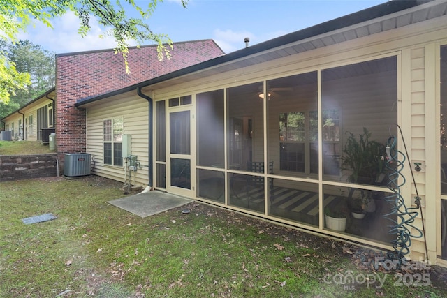 608 Camrose Cir NE, Concord, NC 28025 - rear view of house with a sunroom and a yard