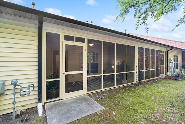 608 Camrose Cir NE, Concord, NC 28025 - rear view of property with a sunroom