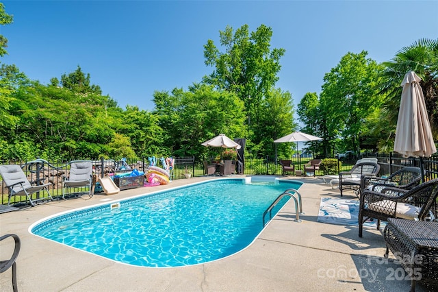 1575 Lewis Farm Rd, Kings Mountain, NC 28086 - view of pool with a patio area and view of wooded area