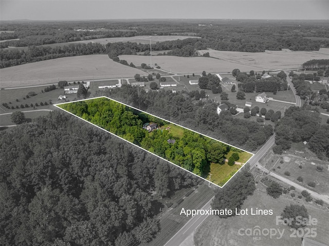 1575 Lewis Farm Rd, Kings Mountain, NC 28086 - aerial view of property and surrounding area featuring a heavily wooded area and property parcel outlined