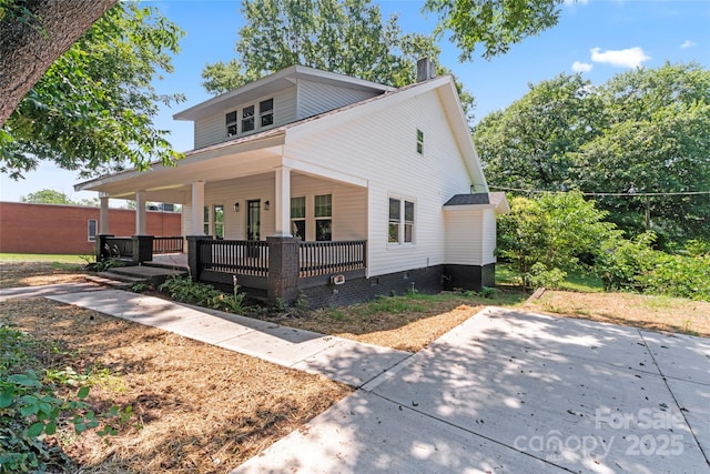 815 E Second Ave, Gastonia, NC 28054 - view of front facade featuring covered porch and a chimney