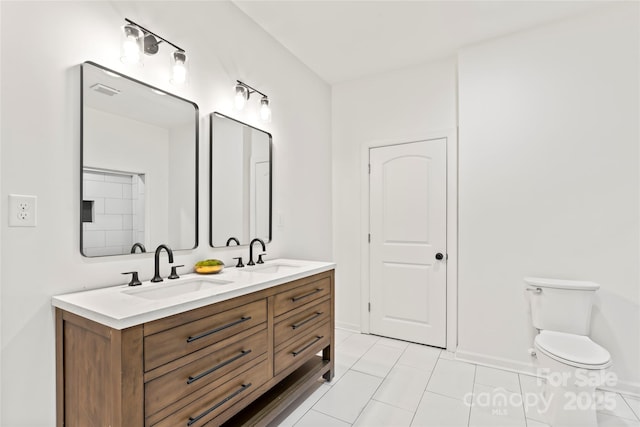 815 E Second Ave, Gastonia, NC 28054 - bathroom featuring double vanity and tile patterned floors