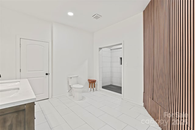 815 E Second Ave, Gastonia, NC 28054 - bathroom with tile patterned flooring, double vanity, and recessed lighting