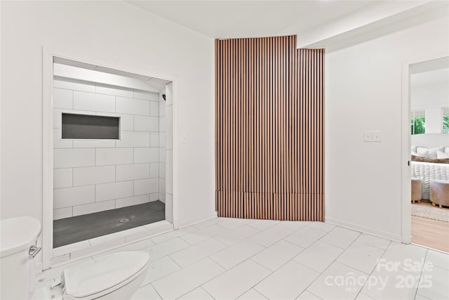 815 E Second Ave, Gastonia, NC 28054 - full bath featuring ensuite bathroom, tiled shower, and tile patterned flooring