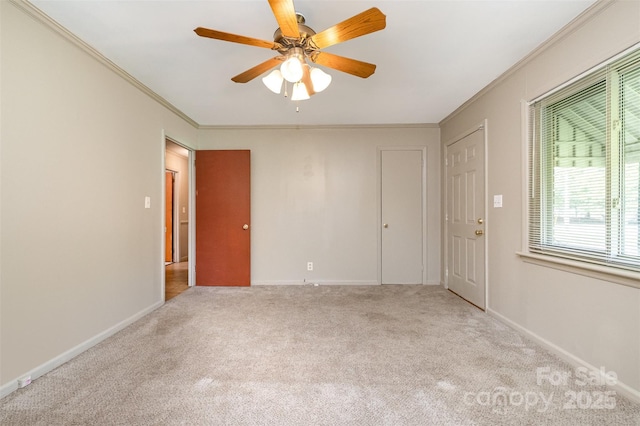 319 Glenhaven Dr, Charlotte, NC 28214 - unfurnished room with carpet, crown molding, and ceiling fan