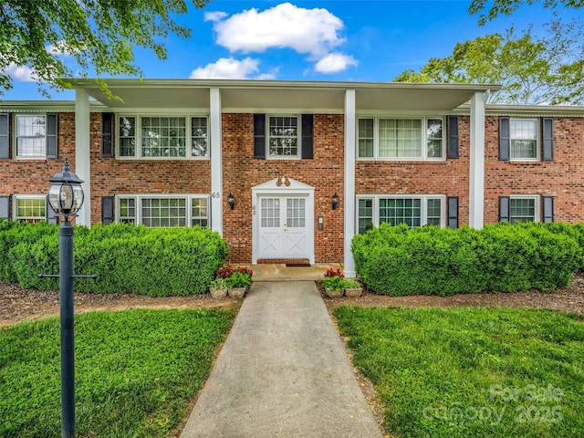 65 Brookside Dr Unit 35, Hendersonville, NC 28792 - view of front facade featuring brick siding