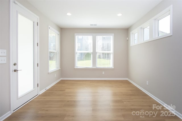 256 W Waterlynn Rd, Mooresville, NC 28117 - spare room featuring light wood finished floors, recessed lighting, and baseboards