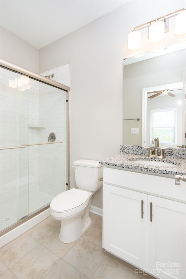 256 W Waterlynn Rd, Mooresville, NC 28117 - full bath with a stall shower, toilet, tile patterned flooring, and vanity