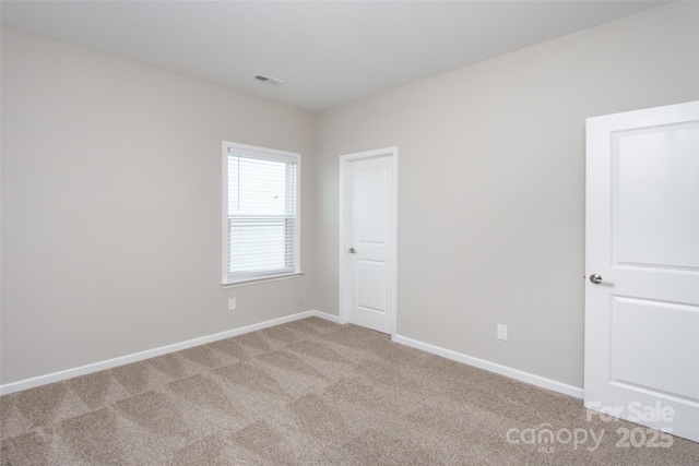 256 W Waterlynn Rd, Mooresville, NC 28117 - empty room with light carpet and baseboards