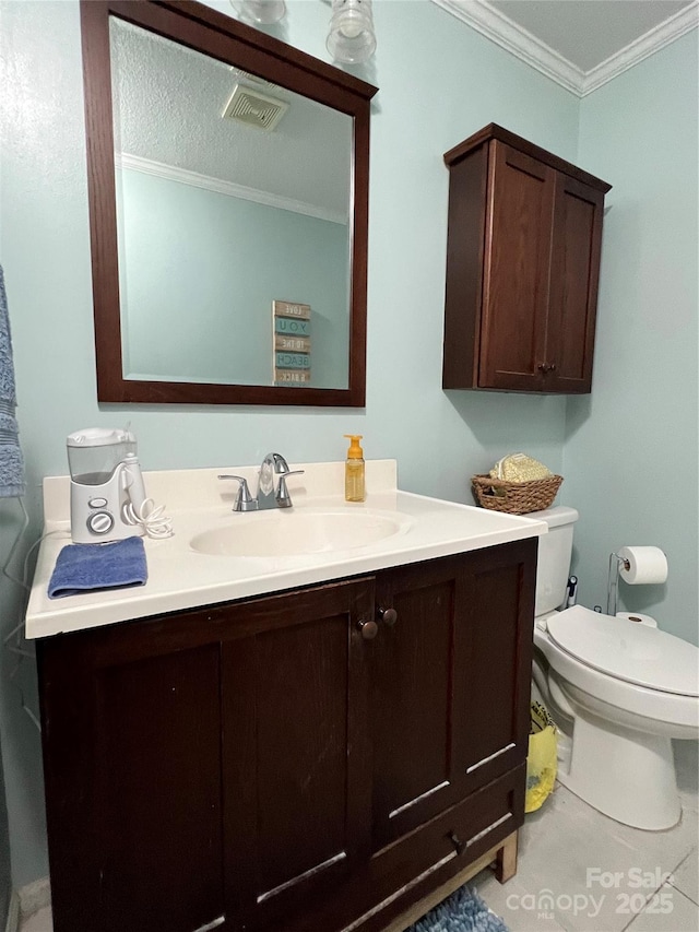 half bathroom with crown molding, toilet, and vanity