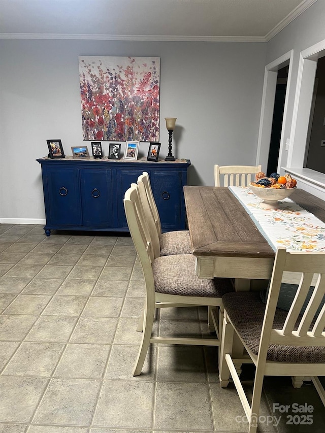 202 Kenwood Ave, Cherryville, NC 28021 - dining room featuring crown molding and baseboards