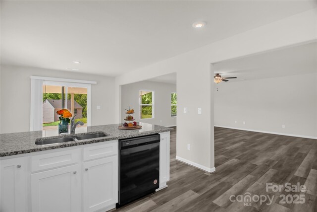 155 Trail Wood Ct, Salisbury, NC 28146 - kitchen featuring dishwasher, a sink, open floor plan, light stone counters, and white cabinetry