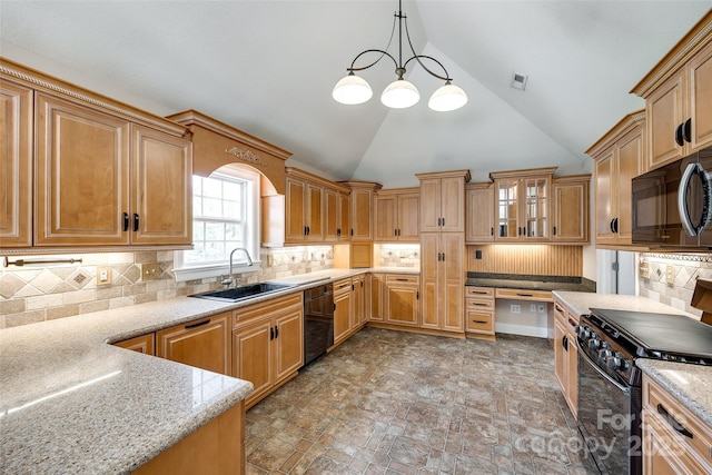 2027 Ellison Dr, Rock Hill, SC 29730 - kitchen with black appliances, lofted ceiling, light stone counters, hanging light fixtures, and tasteful backsplash