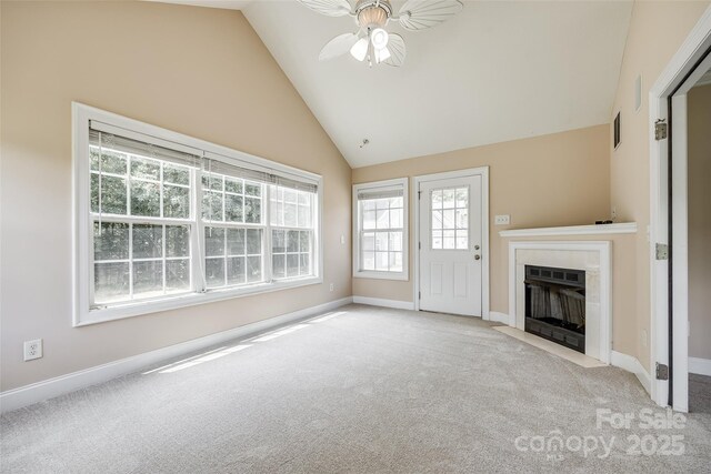 2027 Ellison Dr, Rock Hill, SC 29730 - unfurnished living room featuring carpet floors, ceiling fan, a fireplace with flush hearth, and lofted ceiling