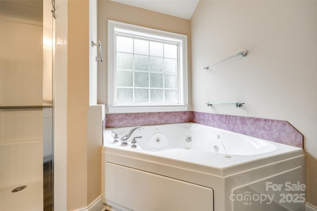 2027 Ellison Dr, Rock Hill, SC 29730 - bathroom with a whirlpool tub and a shower