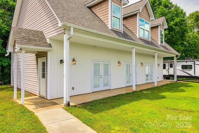 2027 Ellison Dr, Rock Hill, SC 29730 - exterior space featuring french doors, a shingled roof, and a yard