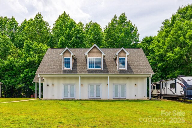 2027 Ellison Dr, Rock Hill, SC 29730 - view of front of property with french doors, a front yard, roof with shingles, and view of wooded area