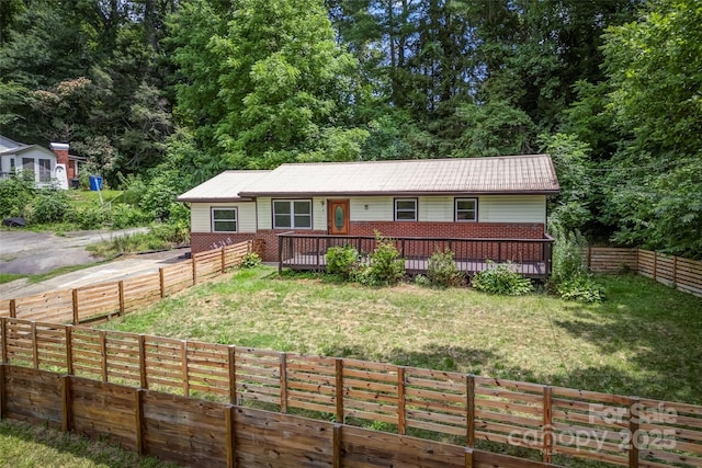 view of front of home with a wooden deck