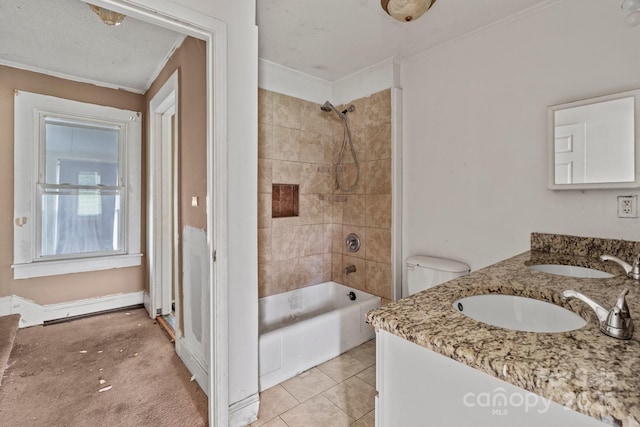 full bath with ornamental molding, double vanity, tile patterned flooring, and tub / shower combination