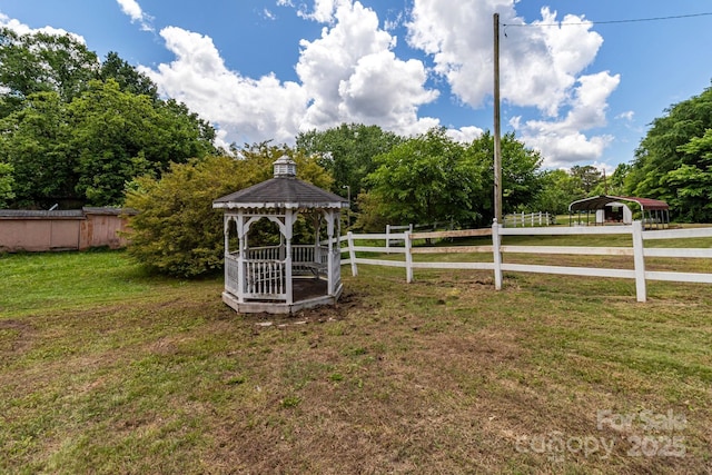 view of yard featuring a gazebo and a detached carport