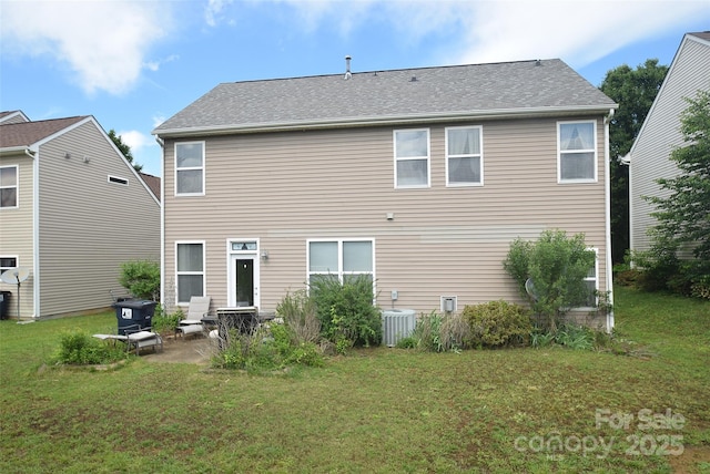 6105 Follow The Trl, Indian Trail, NC 28079 - back of property featuring a lawn, central AC, and a patio