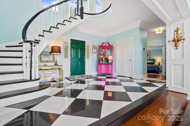 469 Valley Run Dr, Waxhaw, NC 28173 - foyer entrance with stairway and crown molding