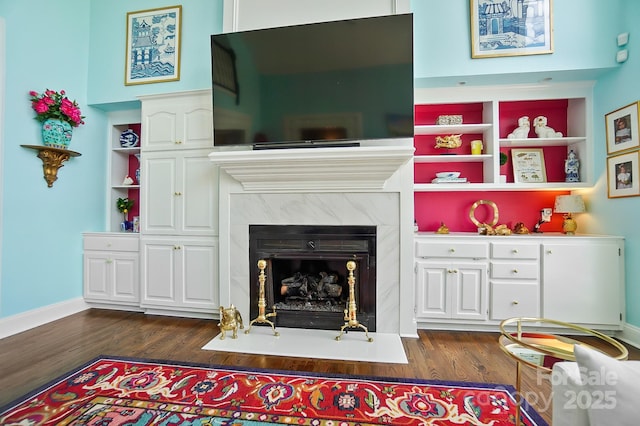 469 Valley Run Dr, Waxhaw, NC 28173 - living room featuring dark wood-style flooring, a fireplace, and baseboards