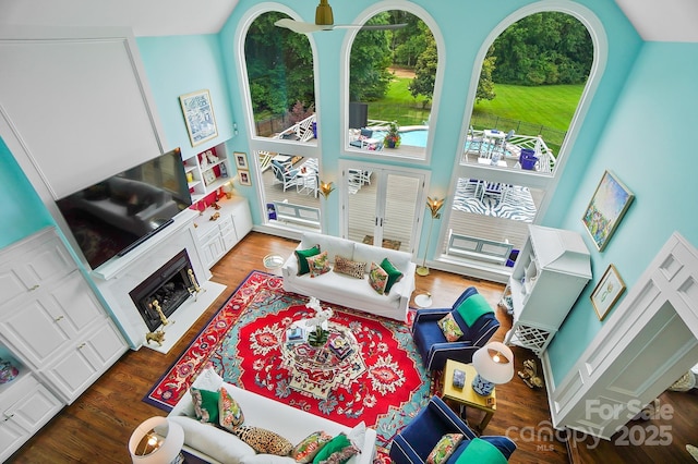 469 Valley Run Dr, Waxhaw, NC 28173 - living area with plenty of natural light, wood finished floors, and a premium fireplace