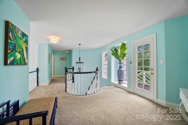 469 Valley Run Dr, Waxhaw, NC 28173 - hallway with an upstairs landing, carpet floors, and baseboards