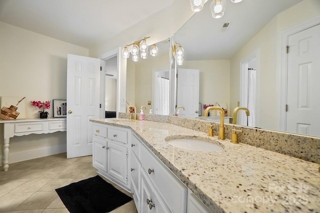 469 Valley Run Dr, Waxhaw, NC 28173 - bathroom with tile patterned floors, vanity, and baseboards