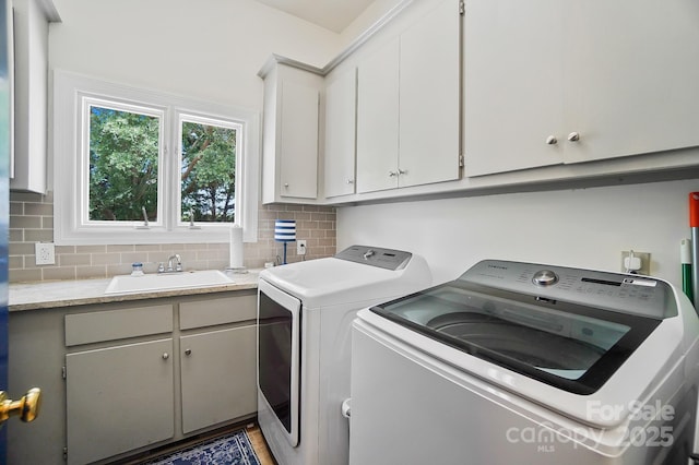 469 Valley Run Dr, Waxhaw, NC 28173 - laundry area featuring cabinet space and separate washer and dryer