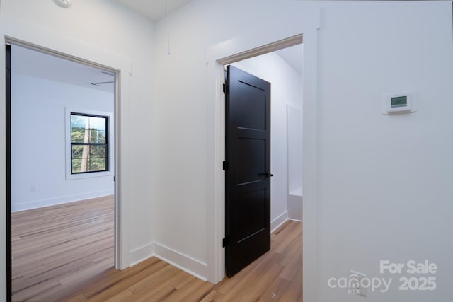 315 W Hoke St W, Landis, NC 28088 - corridor with light wood-type flooring and baseboards