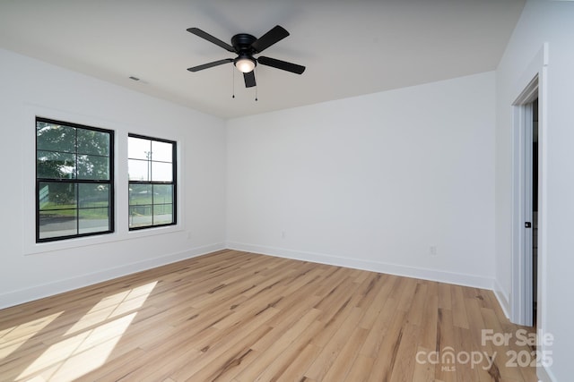 315 W Hoke St W, Landis, NC 28088 - empty room with light wood-style flooring, baseboards, and ceiling fan