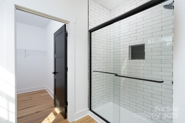 315 W Hoke St W, Landis, NC 28088 - bathroom with a shower stall, wood finished floors, and baseboards