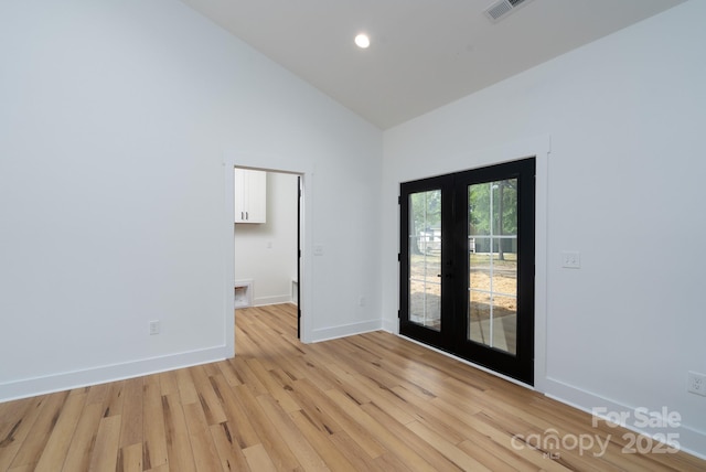 315 W Hoke St W, Landis, NC 28088 - unfurnished room with french doors, light wood-style floors, baseboards, high vaulted ceiling, and recessed lighting