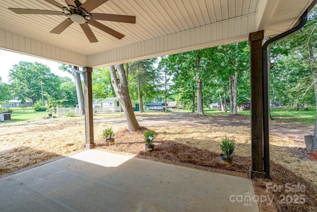 315 W Hoke St W, Landis, NC 28088 - view of patio / terrace featuring ceiling fan and view of scattered trees
