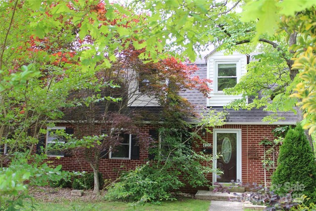 426/432 Maple St, Brevard, NC 28712 - view of front facade with brick siding and roof with shingles