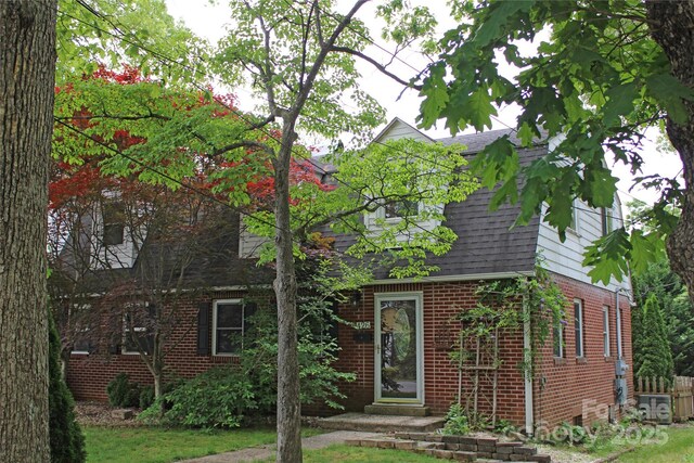 426/432 Maple St, Brevard, NC 28712 - view of front of home with brick siding and roof with shingles